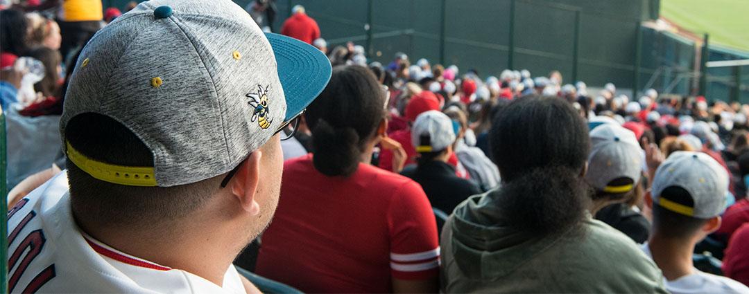 Man wearing Fullerton College hat at Angels game